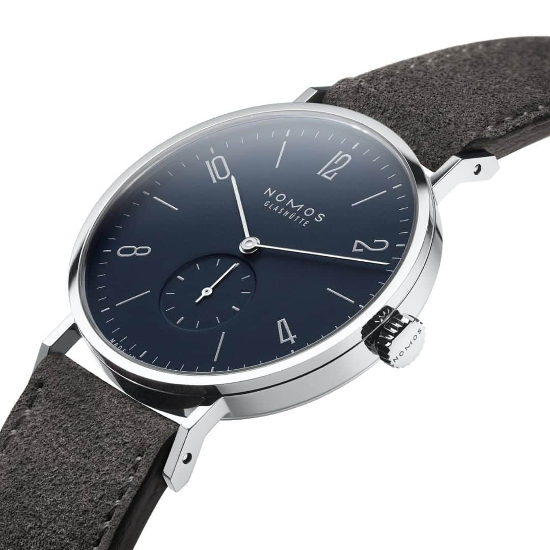 ノモスのインスタグラム：「It’s still winter! In Germany at least. Tangente midnight blue is the ideal way to bring a little sparkle to these short days and long nights.  #nomostangente #tangente #tangentetuesday #nomos #nomosglashuette #watch #watchoftheday #watchgeek #madeingermany #wristwatch #wotd #finewatches」