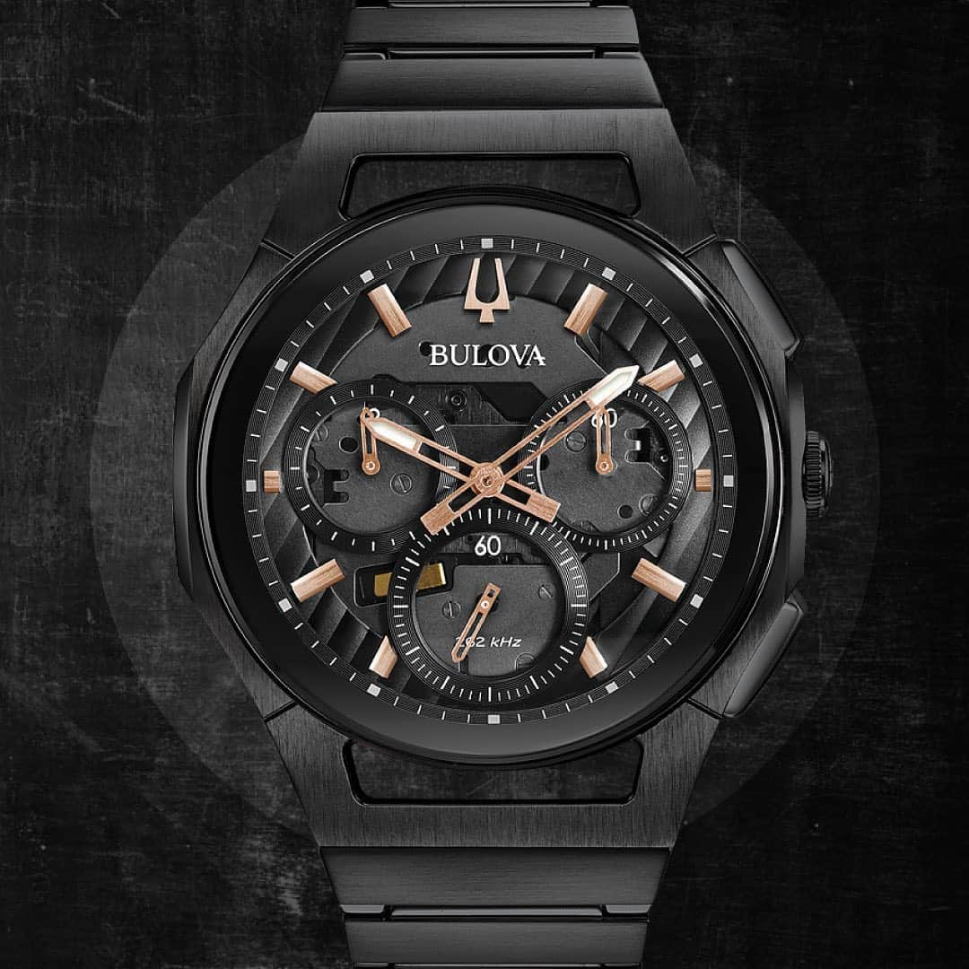 ブローバのインスタグラム：「Shown here in black IP stainless steel with a black dial accented by rose gold-tone hands and markers, the CURV features the world’s first curved chronograph movement and quartz technology with 262 kHz vibrational frequency for precise accuracy. #Bulova #HistoryofFirsts — ⏱: 98A207 MSRP: $1,195 USD CASE: ø 44 mm」