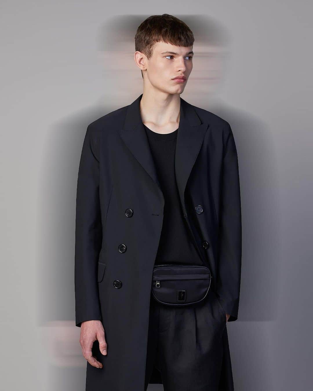 のインスタグラム：「DNA / A UNIFORM FOR THE EVERYDAY  The new NEIL BARRETT SS21 COLLECTION expresses the essence and meaning of the BRAND’S DNA.  @louis_gck in Neil Barrett Minimalist Lightweight Tecno Stretch Double Breasted Coat.  Discover the New Collection at NeilBarrett.com  #NeilBarrett #SS21 #NewCollection #DNA」