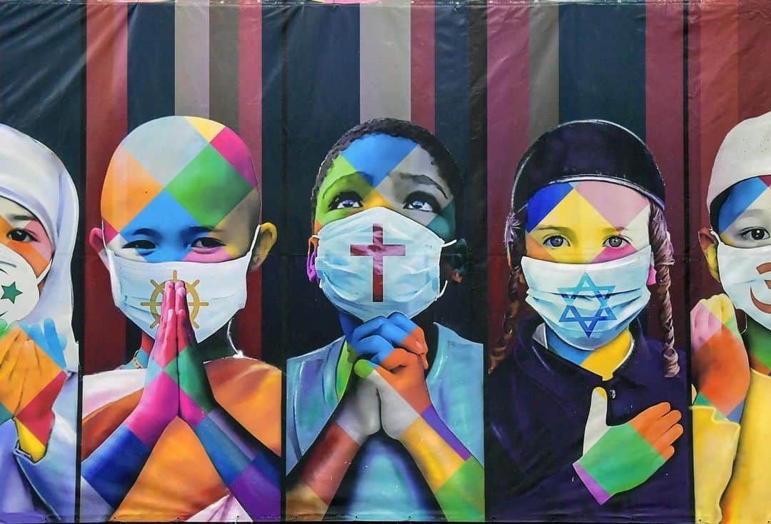 AFP通信さんのインスタグラム写真 - (AFP通信Instagram)「#AFPrepost @aljazeeraenglish - The coronavirus outbreak has inspired some graffiti artists to paint fun or informative works of art on public spaces. Here are some of the graffiti displayed across the globe: ⁠⁠⁣ ⁣  📸Photos: William West, Francisco Robles,  Ina Fassbender, Joseph Eid, Raul arboleda, Mohammed Abed, Mohd Rasfan, Andy Buchanan, Fadel Senna, Nelson Almeida, @afpphoto⁣ .⁠⁠⁣ 1. A woman looks at a mural of a health worker with wings holding a globe in Melbourne, Australia. ⁠⁠⁣ .⁠⁠⁣ 2. A man walks past a coronavirus-related mural, in Acapulco, Guerrero state, Mexico.⁠⁠⁣ .⁠⁠⁣ 3. A boy stands in front of a graffiti painted by artist Kai 'Uzey' Wohlgemuth featuring a nurse as Superwoman on a wall in Hamm, western Germany.⁠⁠⁣ .⁠⁠⁣ 4. A mural depicting a mask-clad boy in front of the Zouk Thermal Power Plant, north of the Lebanese capital Beirut. ⁠⁠⁣ .⁠⁠⁣ 5. A woman wearing a face mask walks next to a painted wall in Bogota, Colombia. ⁠⁠⁣ .⁠⁠⁣ 6. A Palestinian woman walks past a coronavirus-inspired mural in Gaza City. ⁠⁠⁣ .⁠⁠⁣ 7. A medical personnel wearing a protective suit waits at the Covid-19 coronavirus drive-thru test centre outside the Ajwa Private Clinic in Shah Alam on the outskirts of Kuala Lumpur, Malaysia. ⁠⁠⁣ .⁠⁠⁣ 8. A pedestrian walks past graffiti depicting the subjects within famous artworks in Glasgow. ⁠⁠⁣ .⁠⁠⁣ 9. A Moroccan man drives his horse-drawn cart past a mural thanking essential workers in the city of Sale north of the capital. ⁠⁠⁣ .⁠⁠⁣ 10. View of Brazilian mural artist Eduardo Kobra's recent work "Coexistence" which shows children wearing face masks bearing symbols of different religions (L to R) Islam, Buddhism, Christianity, Judaism and Hinduism- in Itu, some 100 km from Sao Paulo, Brazil. ⁠⁠⁣ .⁠⁠⁣ 🔗Tap the link in our bio to learn about how Graffiti tells the story of Egypt’s revolution.⁠⁠⁣ .⁠⁠⁣ #coronavirus #art #graffiti ⁠#health #malaysia #brazil #colombia #morocco #palestine #gaza #germany #lebanon #beirut #mexico #australia⁠⁠」2月25日 2時50分 - afpphoto