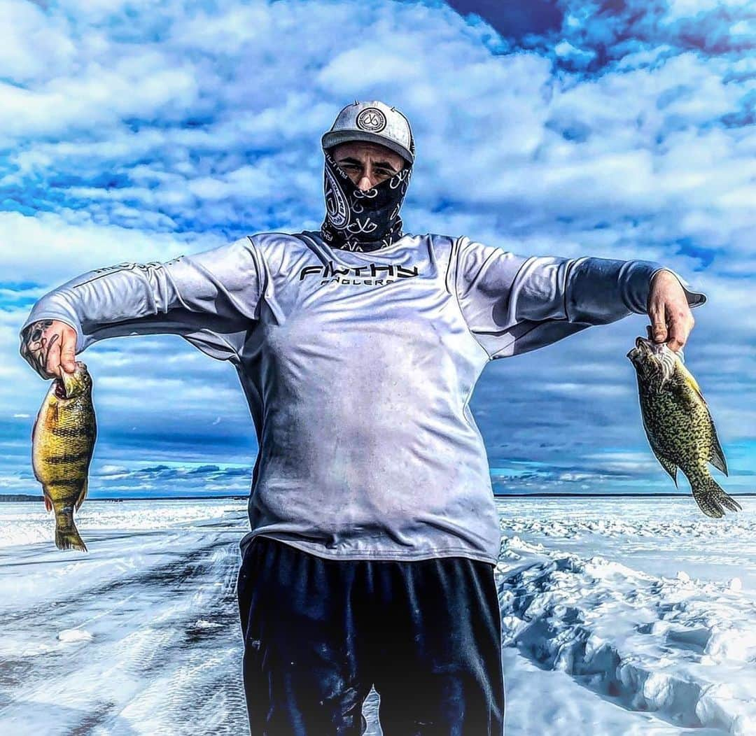 Filthy Anglers™のインスタグラム：「There’s still plenty of ice! Not happy about it...but I am happy about this photo! I swear @breeyawnuh takes the best photos of here man @hambonehodges up in Minnesota! I hope you pay her top dollar buddy. Solid day on the ice for both of them, congrats guys you are Certified Filthy - www.Filthyanglers.com #icefishing #fishing #angler #bassfishing #perch #minnesota #anglerapproved #fish #hunting」