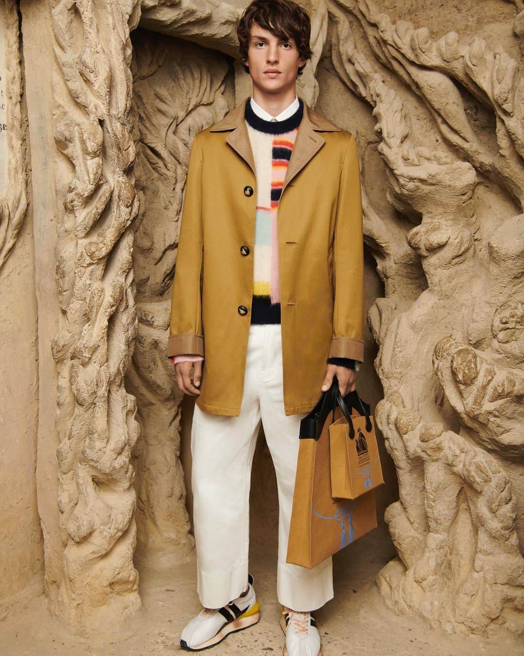 ランバンのインスタグラム：「Light khaki jacket with patchwork knitted sweater and optic white jeans. #LanvinSS21」