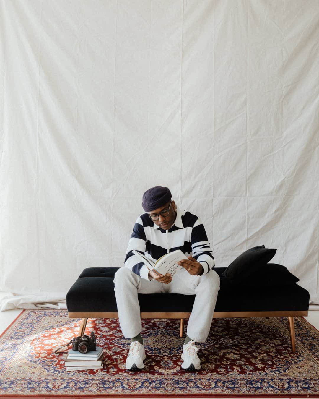 MR PORTERのインスタグラム：「This is your daily reminder to step away from your screen, rest your eyes, and take five. #MRPORTERathome #FriendsofMRPORTER  📷 Mr @joekenneth_ by @xxjmitch  Shop the story: THOM BROWNE - Striped Cotton Rugby Shirt, MR P. - Slim-Fit Denim Jeans, The Mr Porter Paperback - The MR PORTER Guide to a Better Day Paperback Book」