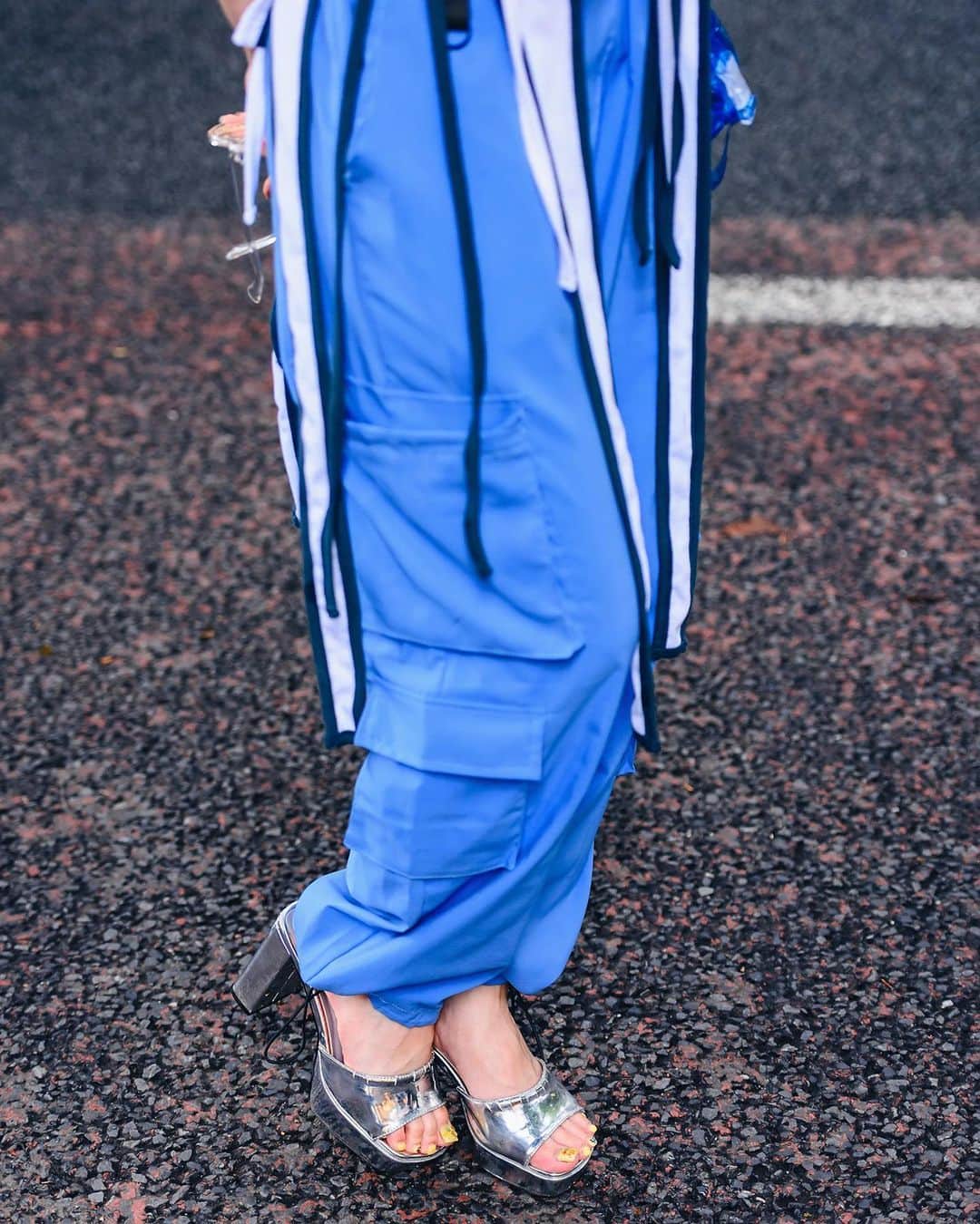 Harajuku Japanさんのインスタグラム写真 - (Harajuku JapanInstagram)「Twin-tailed Japanese Hatsune Miku fan Misuru (@meguharajuku) on the street in Harajuku wearing an MYOB top with hanging straps, blue cargo pants, a Fancy Mental see through waist bag, WEGO accessories, and Office Kiko by Kiko Mizuhara silver chunky heels.」2月26日 5時17分 - tokyofashion