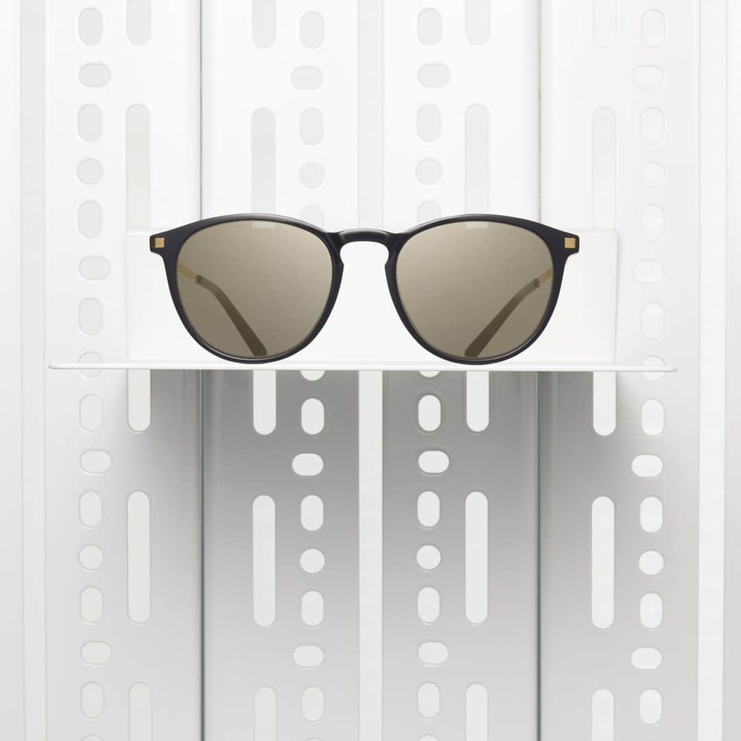 のインスタグラム：「True top-shelf classic – sunglasses NUKKA in Black/Glossy Gold sport a panto-shaped front made of slender acetate with sleek steel temples. The elegant material connection is a click-in design without screws or adhesives.  Available now on mykita.com – free shipping. __ #mykita #mykitalite #handcrafthightech」