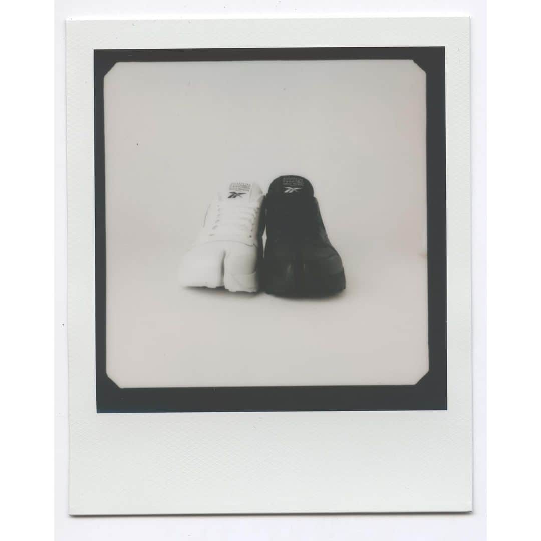 エルエヌシーシーのインスタグラム：「Polaroid proof that we had the now sold out Maison Margiela x Reebok Project 0 Classic Leather Tabi Sneakers in white. We have limited availability in black, but you’ll have to be quick. @maisonmargiela @reebok」