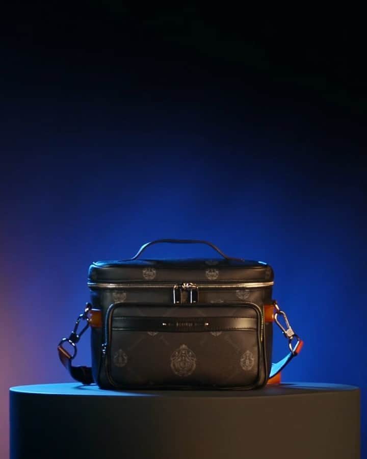 ベルルッティのインスタグラム：「- THE #BERLUTI SIGNATURE CANVAS -  Introducing the “Trek” messenger bag in SIGNATURE Canvas with Nespola orange-patinated Venezia leather details.  Designed by @kris_van_assche, SIGNATURE is inspired from Berluti’s archives, blending the Maison’s logo and the undulating strokes of the iconic Scritto motif, and stamped over a black background with strokes of slate and lead grey reminiscent of the Parisian skyline. Made in a textured coated fabric that resists everyday use, SIGNATURE is completed with Berluti’s trademark finishings, including metallic bootmaker studs and Venezia leather details.   Now available In-Store and on the E-Shop.」