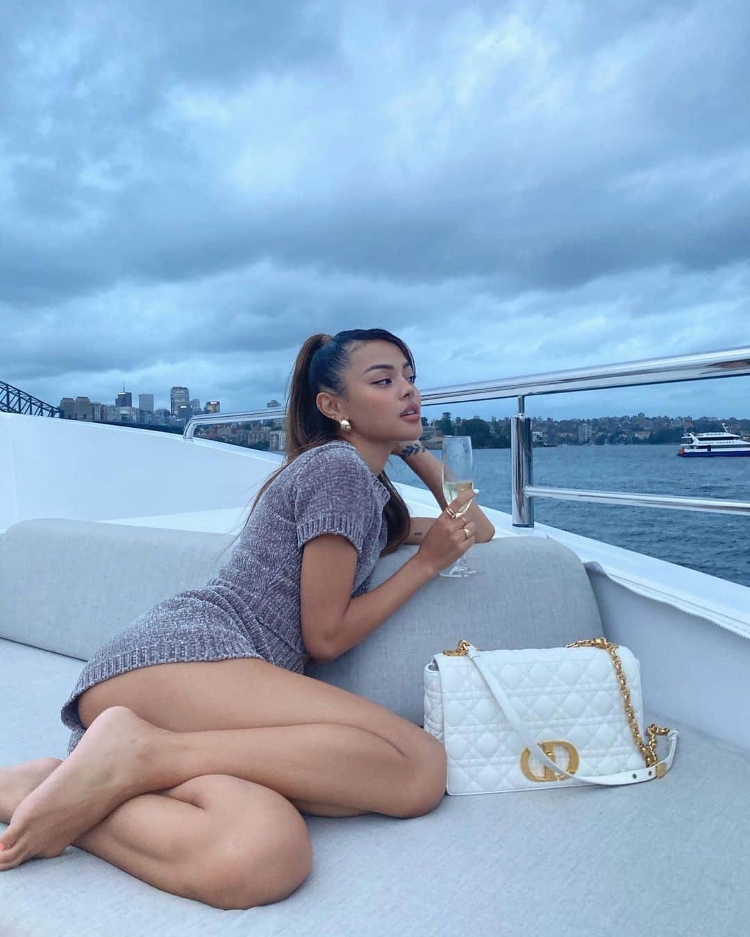 リリーマイマックのインスタグラム：「Cheers 🥂 from great weather to apocalyptic clouds.. this is Australia for ya @revolve @majorelle_collection #revolvearoundtheworld」