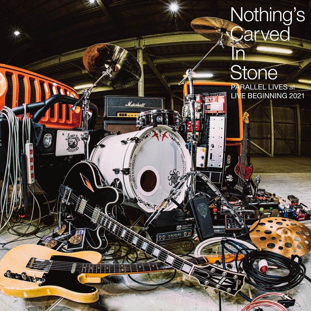 Nothing’s Carved In Stoneさんのインスタグラム写真 - (Nothing’s Carved In StoneInstagram)「【LIVE ALBUM発売決定！】﻿ ﻿ 本日開催の「SPECIAL ONE-MAN LIVE “BEGINNING 2021” feat.『PARALLEL LIVES』」より、『PARALLEL LIVES』完全再現を切り取ったLIVE ALBUM（CD＋DVD）の発売が決定しました！﻿ ﻿ オフィシャル通販サイトでの受注販売となります。﻿ ﻿ ジャケット写真も現在版の機材にアップデートされたものとなっておりますので、ぜひ見比べてみてください。﻿ ﻿ --------------------﻿ LIVE ALBUM（CD＋DVD）『PARALLEL LIVES at LIVE BEGINNING 2021』﻿ 2021年4月末発送予定﻿ 4,000円(税別)﻿ ﻿ 1. Isolation﻿ 2. Silent Shades﻿ 3. Same Circle﻿ 4. November 15th﻿ 5. Hand In Hand﻿ 6. Moving In Slow-Motion﻿ 7. Diachronic﻿ 8. Thermograffiti﻿ 9. New Day﻿ 10. Words That Bind Us﻿ 11. Sleepless Youth﻿ 12. Tribal Session﻿ 13. End﻿ ﻿ Photo by @nishimakitaichi﻿ ﻿ #nothingscarvedinstone #ナッシングス #ncis #silversunrecords #beginning2021 #parallellives」2月27日 20時19分 - nothingscarvedinstone