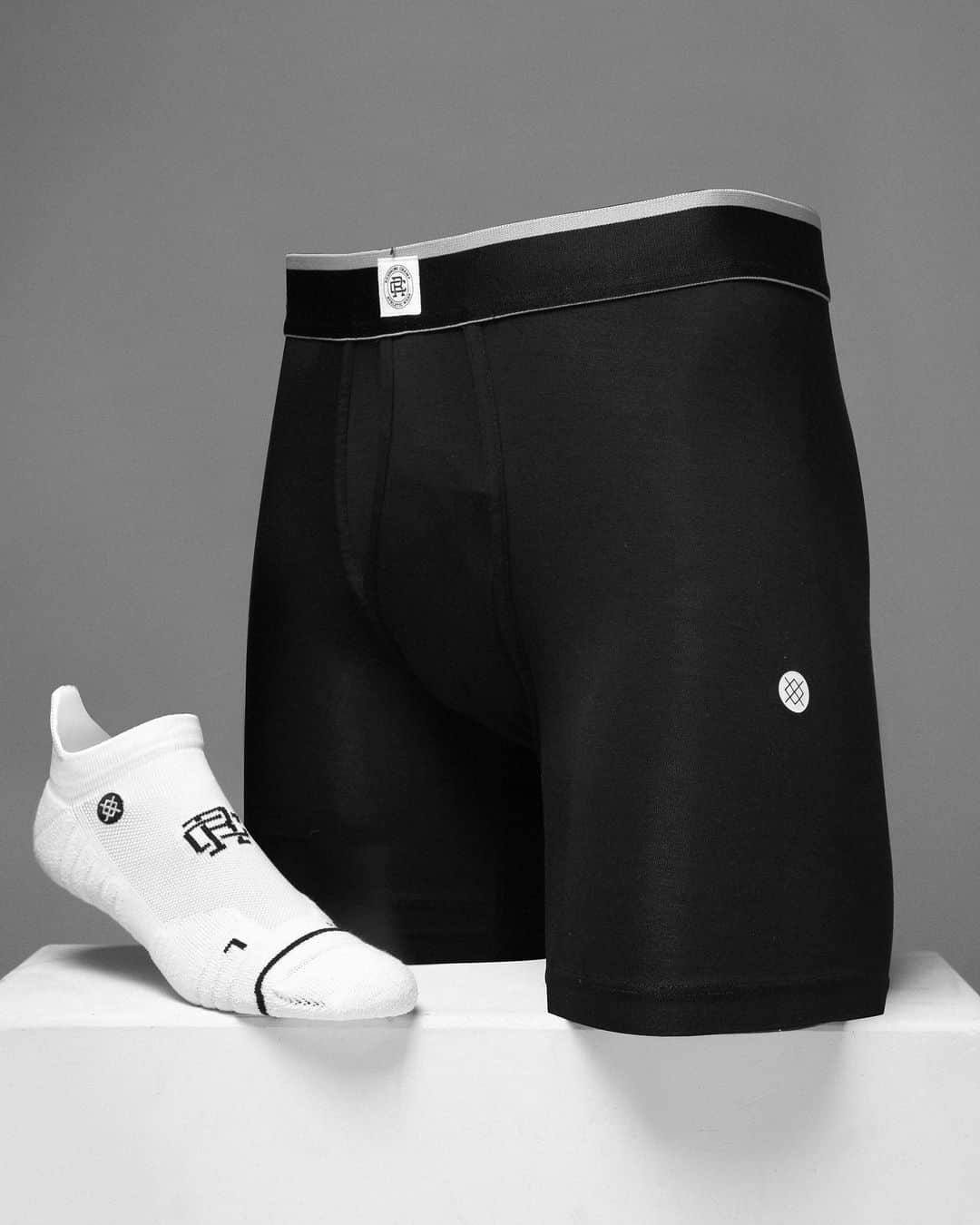 Stanceのインスタグラム：「Masters of simplicity... Our continued partnership with athletic apperal brand @reigningchamp features all gender athletic tab, and crew styles built with Stances’ FEEL360 technology for total  climate control. To round out the collection we just re-stocked our co-branded 6” cotton boxer brief featuring smooth core flex waistband for amazing comfort. Available now on Stance.com. 💪」