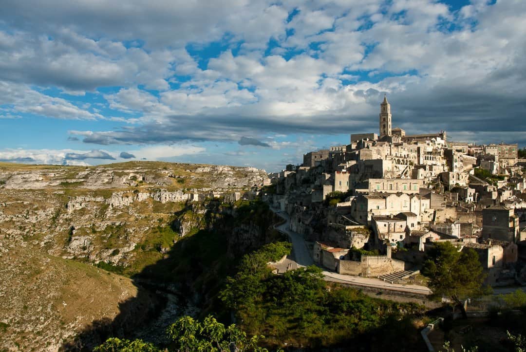 National Geographic Travelさんのインスタグラム写真 - (National Geographic TravelInstagram)「Photo by @francescolastrucci / The historic Sassi are perched on top of the Gravina canyon that surrounds the town of Matera, Italy. At Matera’s core are hundreds of caves once used as dwellings. The Sassi, now on the UNESCO World Heritage List, hold evidence of human settlements from the Paleolithic period to the present day. After a period of decline adventurous artists began moving back, and the recent history of the Sassi is precisely that of an awakening. Caves were restored and turned into more comfortable houses, unique hotels, restaurants, and galleries. Matera came back to life to the point that it was awarded the title of European Capital of Culture in 2019.  Follow me @francescolastrucci for more places, daily life, and stories around the world. #matera #italy #landscapephotography #dailylife」2月28日 4時36分 - natgeotravel