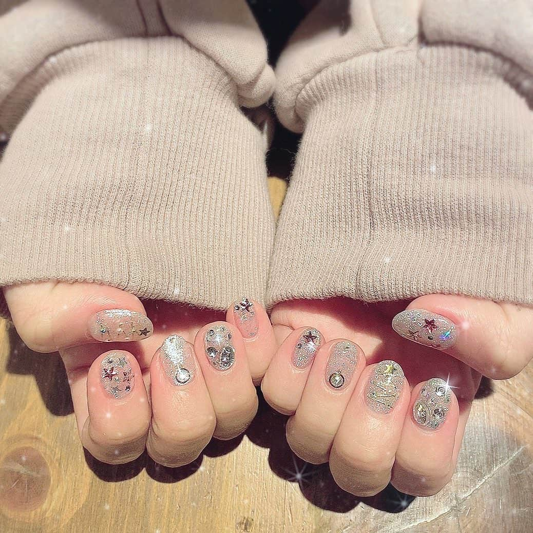 万喜なつみさんのインスタグラム写真 - (万喜なつみInstagram)「new nail💓 センスの塊。  #クリアラメネイル #セーラームーンネイル #ラメネイル #白ネイル #クリアネイル #星ネイル」4月3日 12時24分 - natsumi_poi