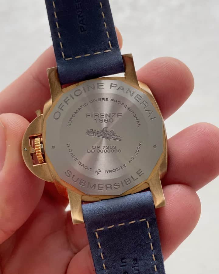 パネライのインスタグラム：「Got to have a like hands on time with the new #Panerai #PAM1074 42mm Bronzo Blue Abisso. What do you think of the new smaller version of the iconic piece? One thing I definitely love is the blue suede strap.  # PaneraiCentral  EDIT-didn’t realize the hot topic it would become. But this version is a prototype. So I believe that’s why it has a solid case back. The real version has a sapphire case back.」