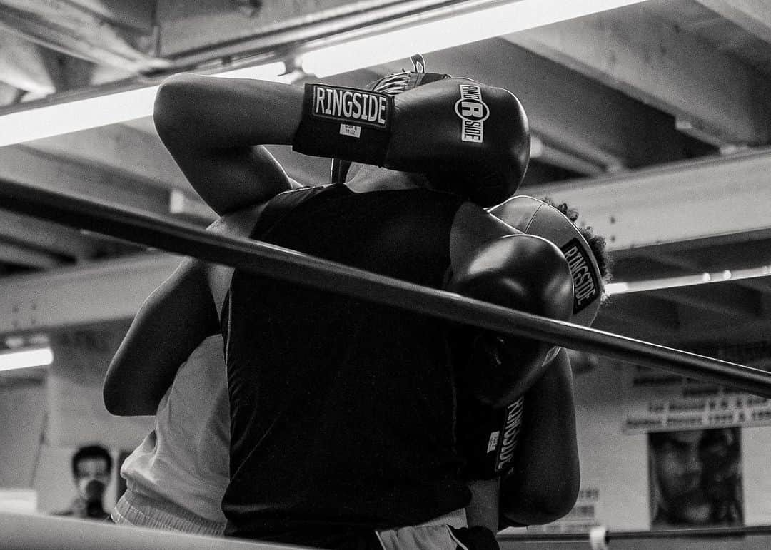 National Geographic Creativeさんのインスタグラム写真 - (National Geographic CreativeInstagram)「Photos by Walé Oyéjidé @ikirejones / Somewhere in Philadelphia, two gloved assailants approach each other from opposite corners of a ring. For one furious round, the city’s ubiquitous orchestra of sirens, dirt bike convoys, and Water Ice trucks, will be quietened as onlookers stare with the attention of devoted Mass-goers. It’s silent as a confessional; save for the landing of blows and the bold encouragement of over-eager coaches. In that small ring, punches and counterpunches serve as counter-intuitive ways to heal those who were on the verge of being broken, those with homes in disarray, and those who live in comfort; but nevertheless, need an escape. Outside, the news laments a pandemic. But here, among the fighters, the ring sings of peace.   This work is supported by the @insidenatgeo COVID-19 Emergency Fund for Journalists.   Follow me @ikirejones for celebrations of beauty in all its forms.」5月1日 0時58分 - natgeointhefield