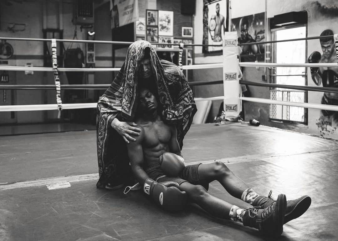 National Geographic Creativeさんのインスタグラム写真 - (National Geographic CreativeInstagram)「Photos by Walé Oyéjidé @ikirejones / Somewhere in Philadelphia, two gloved assailants approach each other from opposite corners of a ring. For one furious round, the city’s ubiquitous orchestra of sirens, dirt bike convoys, and Water Ice trucks, will be quietened as onlookers stare with the attention of devoted Mass-goers. It’s silent as a confessional; save for the landing of blows and the bold encouragement of over-eager coaches. In that small ring, punches and counterpunches serve as counter-intuitive ways to heal those who were on the verge of being broken, those with homes in disarray, and those who live in comfort; but nevertheless, need an escape. Outside, the news laments a pandemic. But here, among the fighters, the ring sings of peace.   This work is supported by the @insidenatgeo COVID-19 Emergency Fund for Journalists.   Follow me @ikirejones for celebrations of beauty in all its forms.」5月1日 0時58分 - natgeointhefield