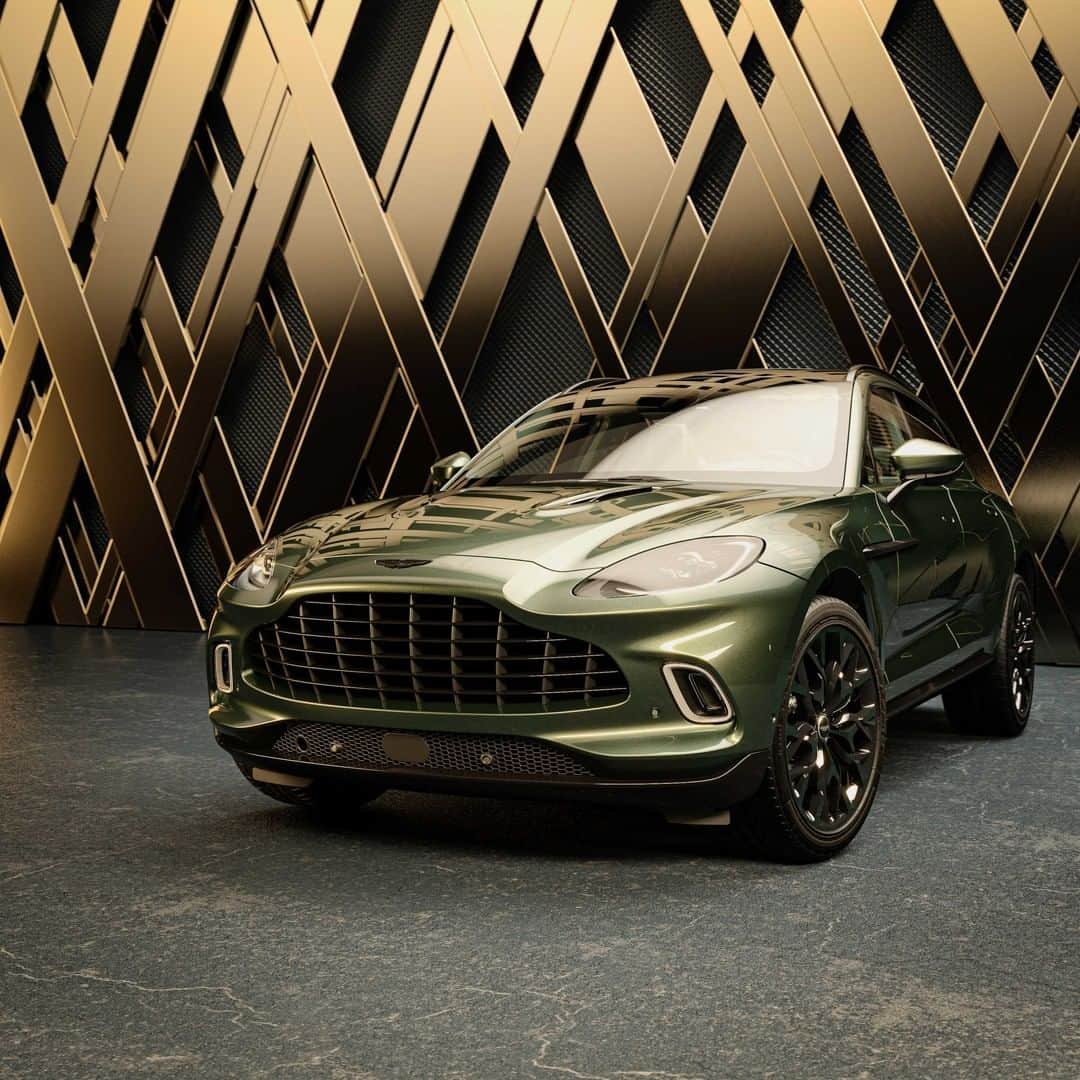 アストンマーチンのインスタグラム：「Evoking the materials, textures and atmosphere of @130william, our bespoke design team, Q by Aston Martin, has worked with Sir David Adjaye to ensure this special DBX’s highly crafted interiors and custom paintwork have a strong synergy with the building’s architecture.  #AstonMartin #DBX」