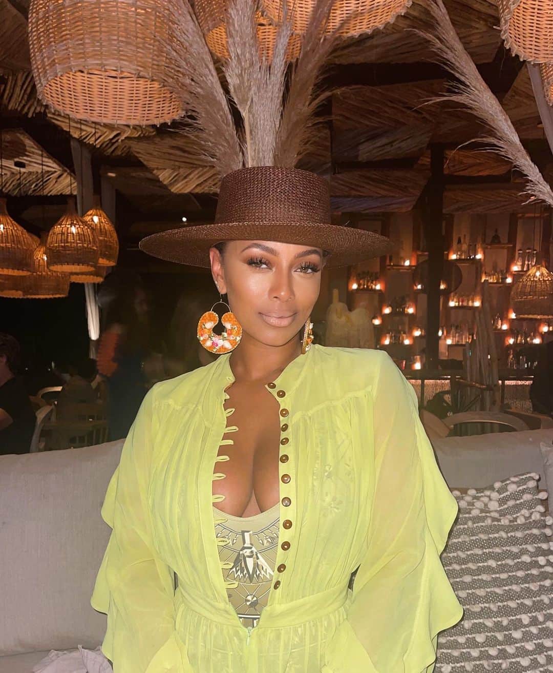 ケリー・ヒルソンのインスタグラム：「Vacation nights...  Sheer jumpsuit: @jaejolly Earrings: @honeybeloved14 Hat: @fruitionhatco  Body suit: @ramomar_ny  (everything I’m wearing is #blackowned 😉)」