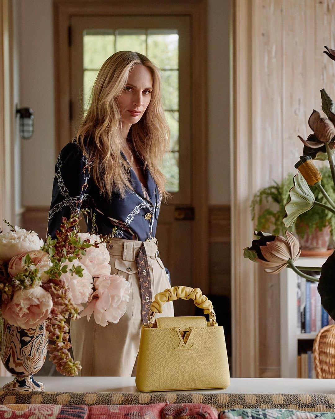 のインスタグラム：「Playfully refined. Lauren Santo Domingo showcases some of #LouisVuitton’s latest Capucines bags in new colors, finishes, and sizes. Explore the collection via link in bio. @thelsd #LVCapucines」