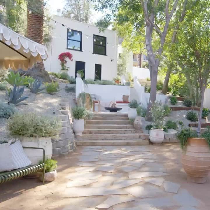 ジュリー・サリニャーナのインスタグラム：「Big reveal: My backyard transformation!!!! 💕 I’m so excited to finally share it with you! My dear friend Erick from @maison_trouvaille just got his own series called Replace this Space with @archdigest - SO MAJOR!👏🏽 I feel so honored & special to be his first guest in his new series with AD! Aw! 🥺 We decided to transform my backyard into a European-Californian escape to help tie in Kevins’ European roots and my California roots together!! I’m crying tears of joy of how happy I am for Erick as this is a huge milestone! He beautifully executed and transformed our backyard into a space that reminds me of my travels to Europe while keeping the essence of where I grew up, California. 💕 See the FULL reveal on @archdigest YouTube channel, link in bio! You don’t wanna miss the squirrel moment!! 🐿  Thank you so much Erick for making me a part of this big moment in your career! I’m so proud of you! I love you!! ❤️ also, pinch me!- I’m on AD!!!」
