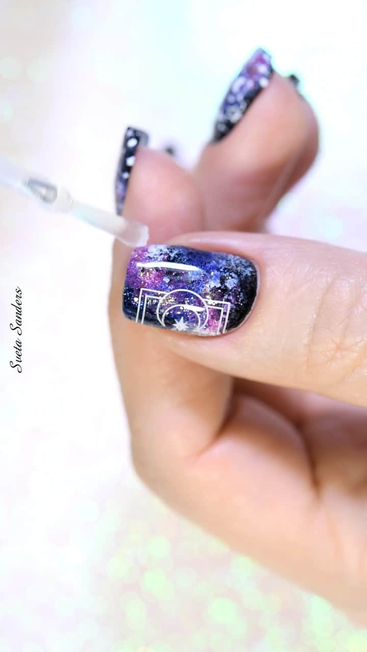 Sveta Sandersのインスタグラム：「🌌Galaxy Nail Art🌌  I used products by @whatsupnails / использованы материалы от бренда @whatsupnails :  Stamping Polishes : 💕 Whats Up Nails “Succulent”  💕 Whats Up Nails “Blanc My Mind”  💕 Whats Up Nails “Squid Escape”  💕 Whats Up Nails “Sun”  💕 Whats Up Nails “Marooned in Color”   💕 Whats Up Nails - Magnified Clear Stamper & Scraper  💕 Whats Up Nails - B058 nailsandtowel Stamping Plate」