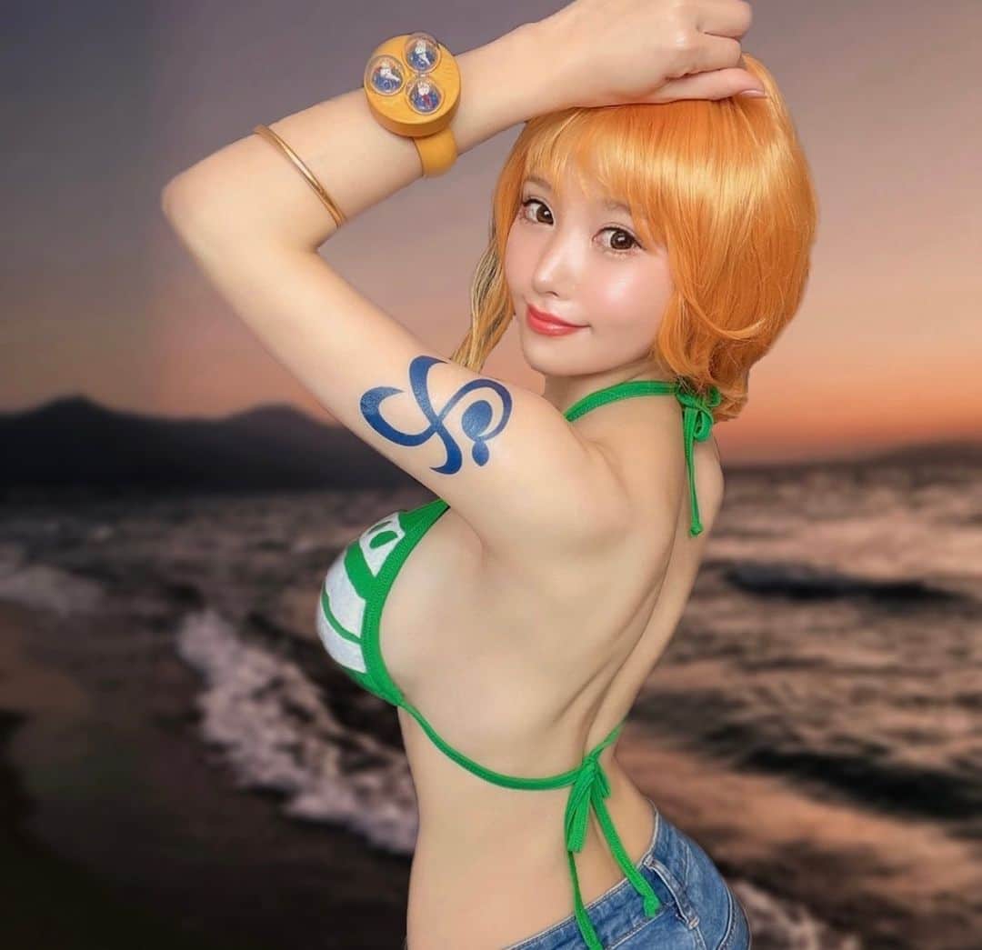 佐崎きさきのインスタグラム：「. . Today's photo is Nami's cosplay from the Japanese anime One Piece. . I will continue to challenge many cosplays in the future! ✨ . . 今日のお写真はワンピースのナミの . コスプレです。🏝🌊 . 今後もたくさんコスプレに挑戦します！✨ . . . #コスプレ #アニメ #ワンピース  #コスプレイヤー #cosplay  #cosplayersofinstagram #cosplaygirl #onepiece  #anime #ワンピースナミ  #ナミ」