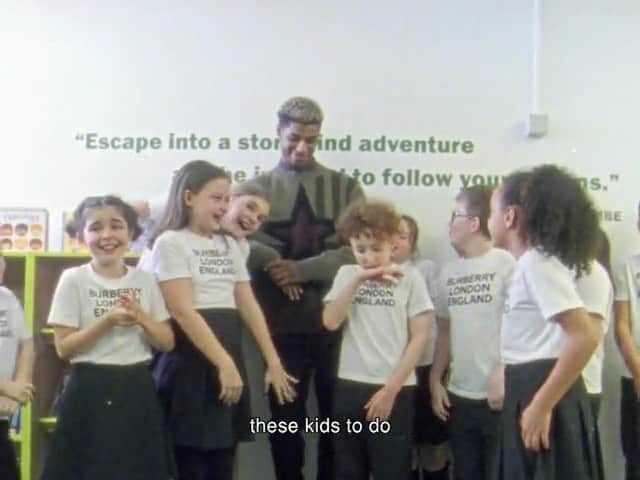 マーカス・ラッシュフォードのインスタグラム：「Visiting our first Marcus Rashford Book Club library in Wythenshawe, South Manchester, with @burberry   Alongside the libraries, the schools will receive a diverse range of books from @macmillankidsuk and training for hundreds of teachers in partnership with @Literacy_Trust  Find out more at Burberry.com 📚 @riccardotisci17   #BurberryVoices #Burberry Directed by @Harry__Wheeler, @Gainsborg and @BenMarshall.DOP」