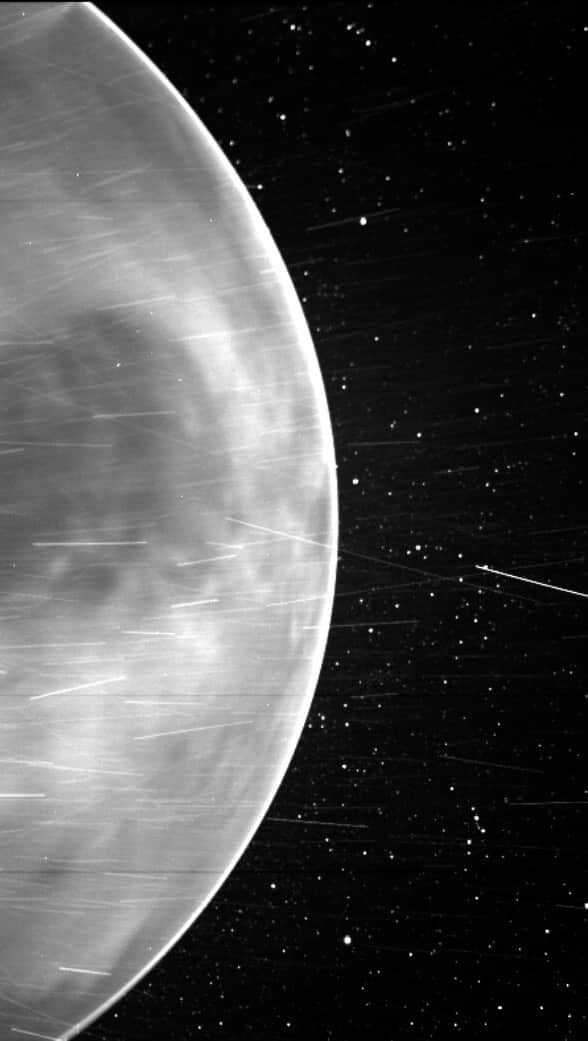 のインスタグラム：「NASA’s Parker Solar Probe has taken the first ever visible light images of the surface of Venus from space. 📷  Smothered in thick clouds, Venus’ surface is usually shrouded from sight. But in two recent flybys of the planet, Parker Solar Probe imaged the entirety of the nightside in wavelengths of the visible spectrum, right at the edge of what the human eye can see, and extending into the near-infrared.   The images, combined into a video, reveal a faint glow from the surface that shows distinctive features like continental regions, plains, and plateaus. A luminescent halo of oxygen in the atmosphere can also be seen surrounding the planet.  These images of the planet, often called Earth’s twin, can help scientists learn more about Venus’ surface geology and what minerals might be present on the surface, as well as the planet’s evolution. Given the similarities between Venus and Earth, this information can help scientists understand why Venus became inhospitable to life while Earth became an oasis.   Learn more at the link in our bio! #VisionsOfVenus」