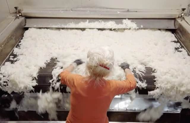 thephotosocietyのインスタグラム：「Video by @lucalocatelliphoto | A worker checks recycled wool in a factory in Prato, Italy. This white fluffy stream of fibers is the end product of a long process that has been mastered in Prato for over a century, after a law prohibited the import of raw wool—and promoted the rise of textile recycling in this small Tuscan city.  It is estimated that worldwide only 1% of our discarded clothing is ultimately recycled into new garments because of the complexity and the lack of sorting. Yet companies in Prato say  they successfully recycle over 15% of garments in the recycling stream worldwide, with a market value of $2.5 billion.  Could Prato represent a model for sustainability recycling  textiles, often wasted in landfills or incinerated? This video is part of my ongoing investigation around Circular Economy. Please follow me @lucalocatelliphoto to discover more. #circulareconomy #solutions #futurestudies #thecircle #textile #recycling #italy #waste #environment #lucalocatelliphoto」