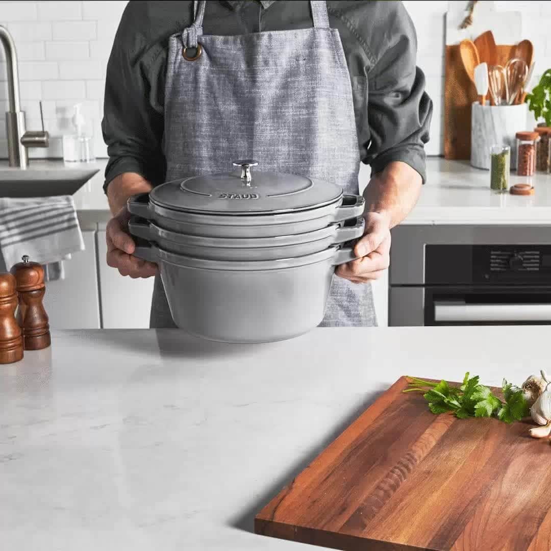 Staub USA（ストウブ）のインスタグラム：「STAUB Stackable is the space-saving cast-iron cookware set that passionate home cooks have been dreaming of. Our 4-piece set offers everything you need to cook a variety of dishes, including a cocotte, a braiser, a grill pan, and a universal lid to top it off. Each piece nests neatly into the stack and is protected from chipping thanks to the included rubber bumpers. Find Stackable in our Instagram Shop. #madeinStaub」