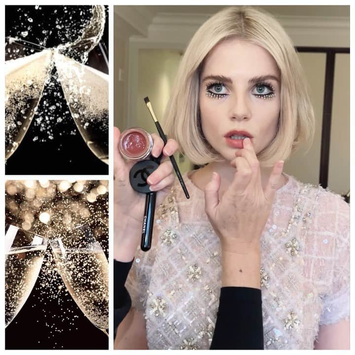 JO BAKERのインスタグラム：「L U C Y • B O Y N T O N 🇬🇧 Bubbles, Fizz & Celebratory inspired #champagnelashes on #lucyboynton for this years #metgala !!  I always wait til the day of the event to create the look ~ being with the team and  seeing the dress in person is when the hair and makeup really comes together.  Seeing the stunning sequined pale lavender jeweled @chanelofficial gown in person made me think of champagne, bubbles and fun feelings being back with Lucy for this fabulous event.  Keeping her skin delicate porcelain with a soft subtle glow I put the attention all on her eyes. Once fattened with mascara (will be posting all product deets on stories tomorrow)  I threaded tiny pearlescent beads into the upper lash line and crystals adorned the lower lashes with two tone gems that shone pinky lilac - in tonal harmony with the  dress.  Lips kept deliciously balmy with an English rose hue to balance the cool tones and frosty feels.  Taking off back to LA … head over to @welovecoco for exact products used for this look. More deets and bts when I land back in LA 💋‼️ #makeup #jobakermakeupartist using @chanelbeauty #welovecoco @welovecoco #workingwithchanel」