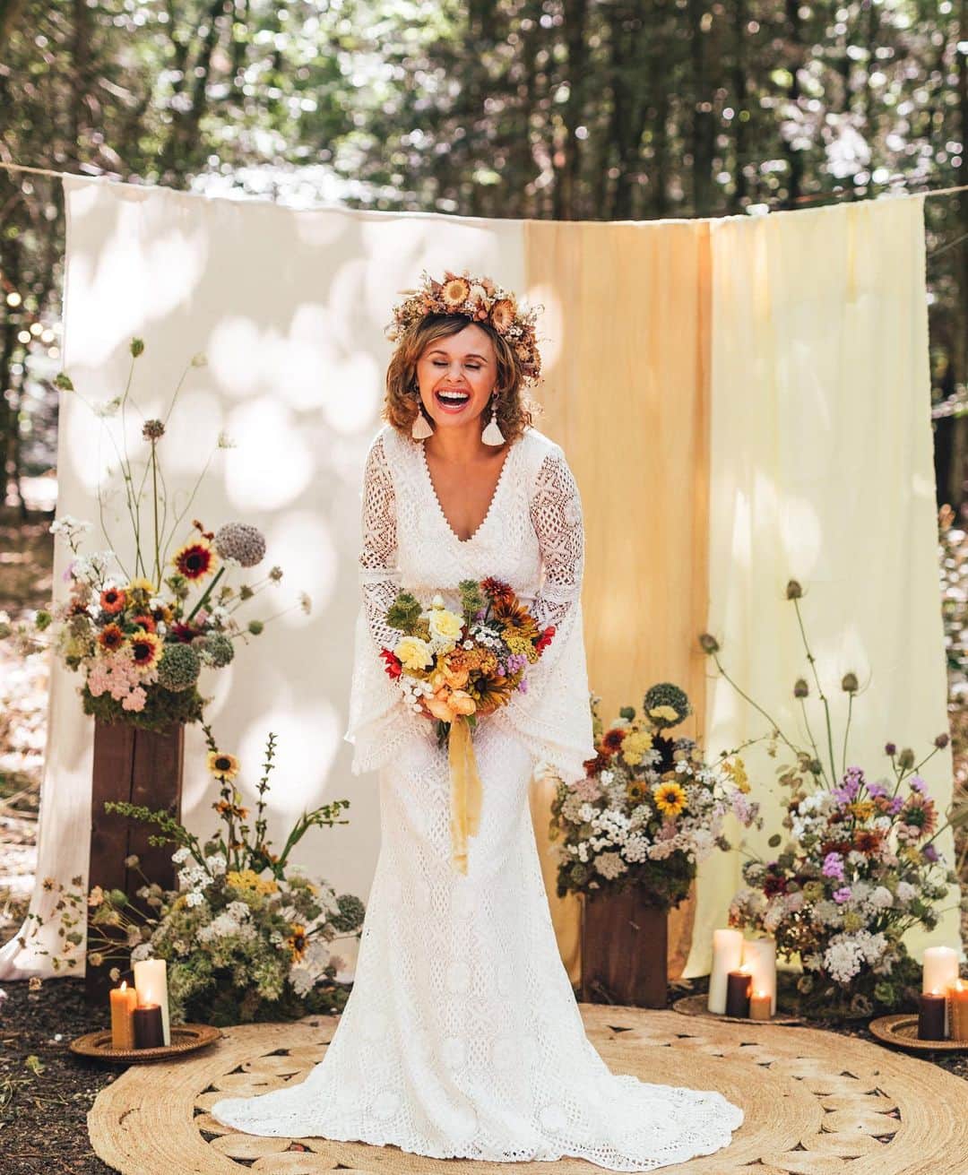 ミナのインスタグラム：「A bohemian bride is free-spirited and a hopeless romantic. 🤍  A design element representative of a boho wedding dress is a statement sleeve. Our Wylie dress is a showstopper with the most dreamy bell sleeves that add the final touch to the perfect bohemian flair look.   #IndieBrideLondon   Credits:  Venue: @longtonwood Photography & Concept: @kirstymackenziephotography Stylist, Props & Concept: @toasthq Flowers: @_anniefern_ Cake: @avantgardecakestudio Stationery: @sundownpaper Crochet Dress: @indiebride.london Hat: @gigipip Suits: @greshamblake Real Couple: @theroyalcouple_sj @_savannadarnell @iamtheroyalguard Headpiece & Button hole: @f.o.l.k.y.d.o.k.e.y  Bridal Accessories: @thevamoose  Vegan Grazing Table: @gracefully_grazing  Hair & Make-up Advice: @joyceconnormakeup Tableware: @elvis_robertson_ceramics  Glassware & Table Hire: @placesettings_」