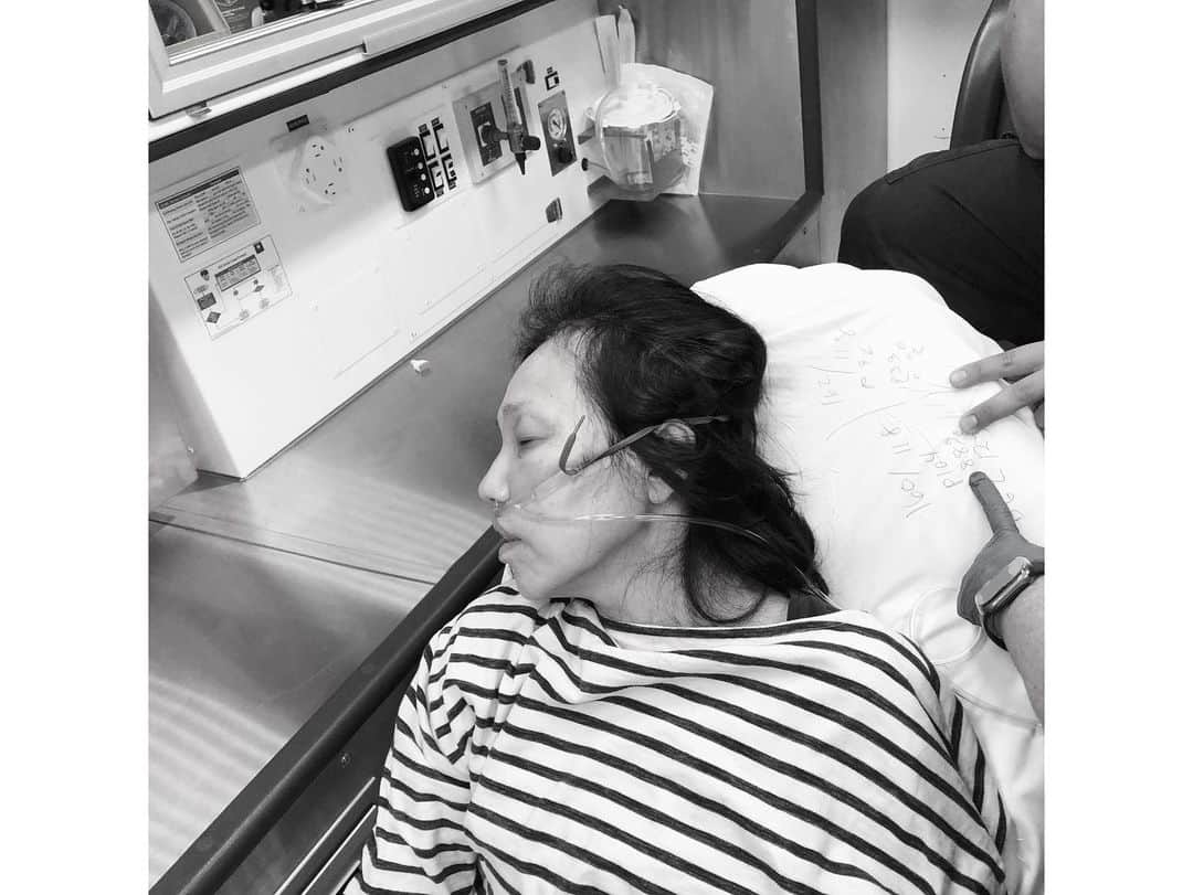 Q. Sakamakiのインスタグラム：「Third anniversary: Three yeas ago today— (Aug 24th, 2019), my wife Kuniko got stroke and multi bran bleeding due to RCVS, a rare illness, triggered by Prozac, antidepressant. It totally changed the life of my wife and me. She could survive through the craniotomy, skull removing brain surgery, by great doctors in Columbia hospital. However, she got paralysed on the left. It still largely remains so. She has to be cared or supervised nearly all the time. Yet luckily, with a quad cane she can walk now, if it is short and the ground is totally flat. I haven’t posted her photos after her stroke. I feel now to do so, to continuously live and go forward for our life, and to share about how life is changeable and how health is important. 1st image: Kuniko in the ambulance on Aug 24th, 2019. 2nd: Kuniko cared by nurses in ICU on Sep 3rd, 2019, after having waken up from coma for several days. 3rd image: Kuniko at the real beginning of physical therapy, on Sep 11th, 2019. 4th image: Kuniko day before going back to hospital for putting her new plastic skull, on Nov 2nd, 2019.」