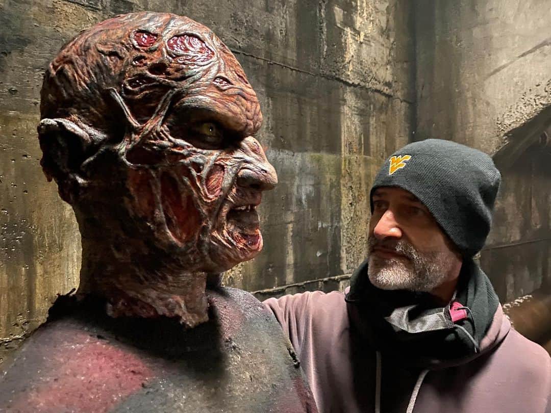 グレゴリー・ニコテロのインスタグラム：「One of the fun little Easter eggs that I “hid” in the episode of TWD I directed last weekend was a re-creation of the Freddy Krueger makeup from part one of “a nightmare elm street”. I always loved this character and all versions of the character i.e. David Miller and @yagherfx . this is a photo of my best bud and veteran of years of applying Robert’s make up @crognalegino touching up the likeness sculpted by @mikeyrots if you look closely you can see the striped sweater and a distressed glove #freddykrueger played by @garrettzehner」