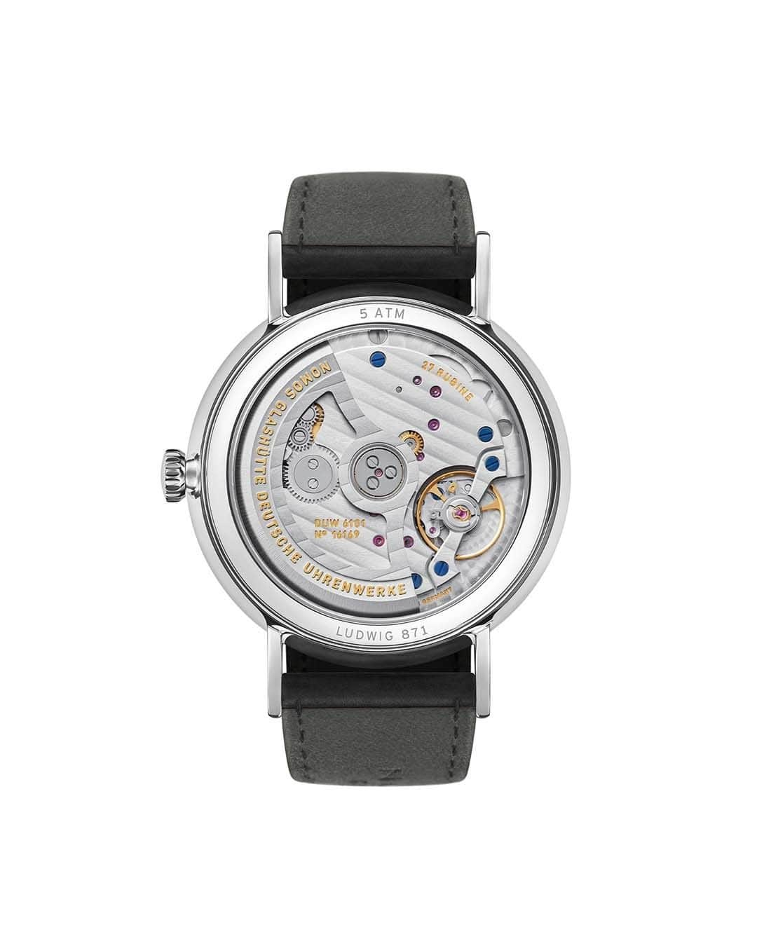 ノモスのインスタグラム：「Powered by mechanical innovation: At the heart of Ludwig neomatik 41 date is the automatic caliber DUW 6101. Its patented date mechanism offers quick adjustment in both directions—a solution that is as elegant as it is practical.   #nomos #nomosglashuette #glashütte #nomosludwig #ludwig #nomoswatch #nomoswatches #madeinglashuette #nwa #watchrelease #newwatchalert」