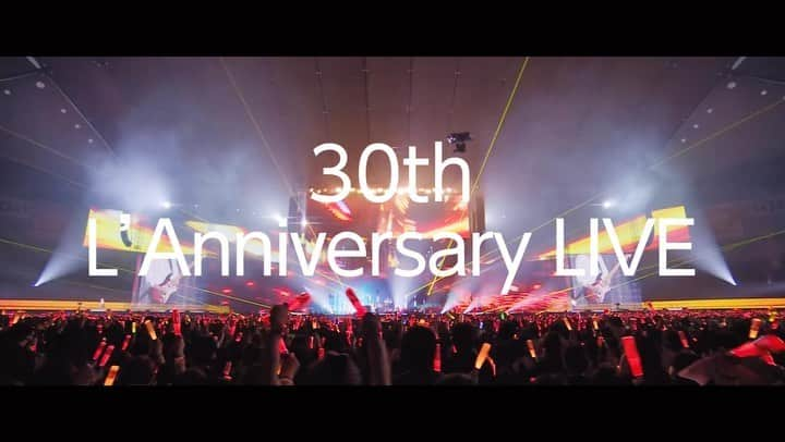 L'Arc-en-Ciel【公式】のインスタグラム：「#プライムビデオにラルク降臨  今年5月に東京ドームで10万人を動員した 『L’Arc～en～Ciel 30th L’Anniversary LIVE』  そのLIVE映像と舞台裏を記録したドキュメンタリー映像が12/23(金)にPrime Videoで世界独占配信決定！  世界に新たな虹をかけよう🌈 . . L'Arc-en-Ciel coming on PrimeVideo  “30th L’Anniversary LIVE” Held this May at Tokyo Dome with an audience of 100K  The LIVE footage & the backstage documentary will be available only on Prime Video on Dec 23 (Fri)!  Let’s create a new rainbow for the world  #LArcenCiel #ラルク #LArcPrimeVideo」