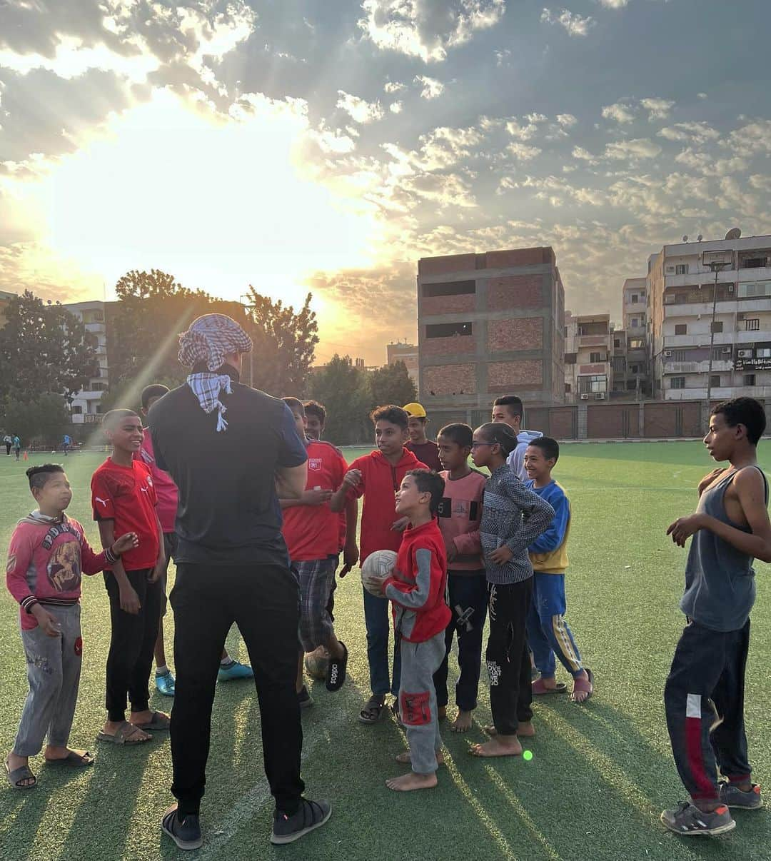 ジャンカルロ・スタントンのインスタグラム：「In Edfu , I saw these kids playing ⚽️ . As I’m watching, one comes up to me spinning a ball in his hands & said (in Arabic ) “Are you going just stand there or are you gonna  play with us “ lol  So we started picking teams    He was hoping I’d be good, as you can see by my shot I am not world cup ready & needed some lessons from them😆 One of my favorite interactions !」