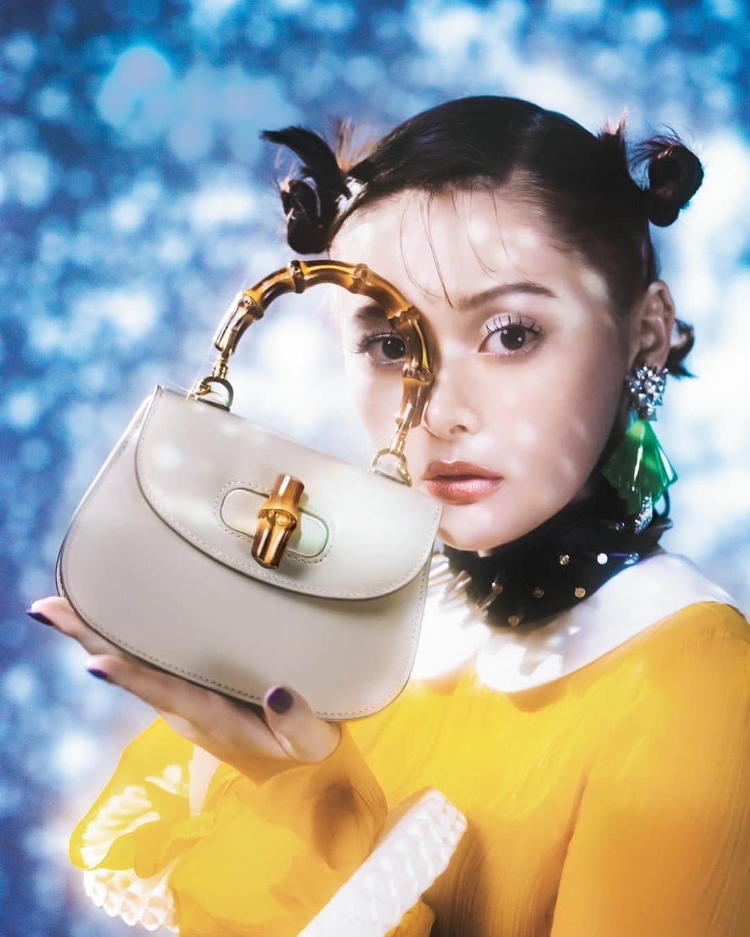 玉城ティナのインスタグラム：「現在発売中の『GINZA』 １月号のGucciの〈グッチ ギフト〉 コレクションのページにモデル として出演しています🧚🏻  星降る夜を背景にした素敵な 誌面になっていますのでぜひぜひ ごらんください〜衣装もメイクも 全部かわいくしてもらいましたョ🥂  また、美しい星の光が散りばめられた「Gucci Gift Pop-Up shop」 が本日から開催されておりますので、そちらもチェックしてギフト選びの参考にされてください💎  Gucci Gift Pop-Up 2022年12月14日（水）～27日（火）  伊勢丹新宿店 本館1階  プロモーション  岩田屋本店 本館1階  KIRAMEKI BOARD  #GucciGift  @gucci 伊勢丹新宿店 #isetanshinjuku @isetan_shinkjuku  #岩田屋  @iwataya_honten」