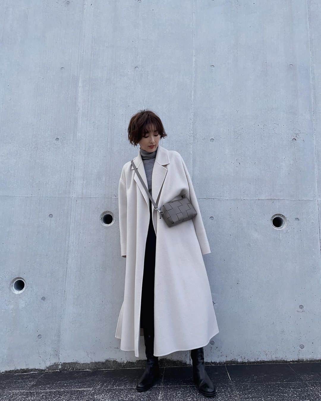石井のり子のインスタグラム：「** 寒いー。 それしか出てきません🥹  coat #norc  tops #uniqlo  skirt #edistcloset  boots #sartre  bag #iacucci#イアクッチ @iacucci_jp」
