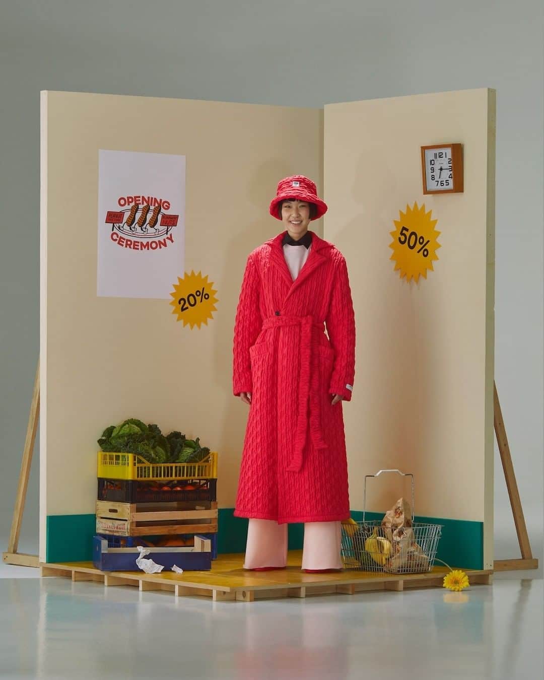 オープニングセレモニーのインスタグラム：「Opening Ceremony Exclusive: quilted strawberry long coat to light up your Winter ❤️‍🔥  Tap and shop.  Photo by @pietro_cocco Styling by @johannabouvier_ Set Design by @steiner_wolinska」