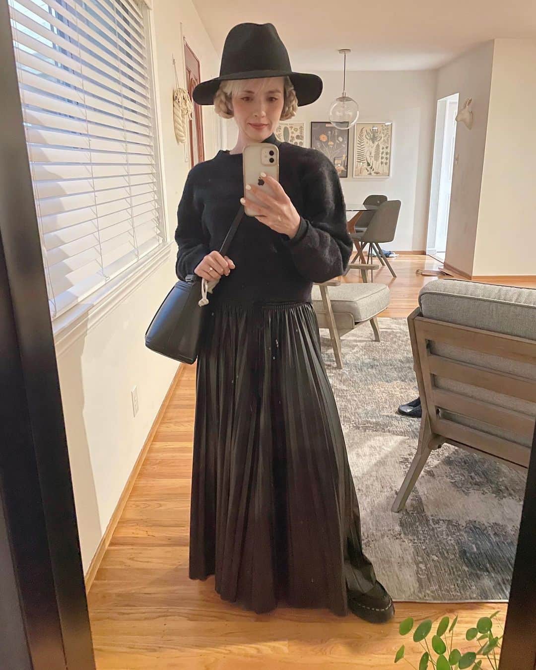 OLIVIAのインスタグラム：「Outfit of yesterday: Our family’s been into the goth look recently, inspired by Tim Burton’s recent TV show Wednesday. You’ll catch us posing for pictures with wide eyes and stoic facial expressions- inspi Addams Family. 🤣🤣🤣  Crystal of the week: My amethyst skull. I’ve been drawn to this purple color naturally the last few days- picking up purple flowers too. I’ve also been reaching outside my comfort zone a lot these days, so amethyst assists me with expansion while also providing me with some protection and helps me with grounding myself. I’ve been meditating everyday again since being back from Japan and when I meditate (aka not scatter brained) I get very good at energy reading, can connect with other dimensional spirits/beings and can get readings of the near future. Amethyst assists me with making these connections.   Flower of the week: Baby pink hyacinths. Hyacinths are know for their alluring fragrances but the name comes from complex symbolism through Greek Mythology. Pink hyacinths symbolize playful joy.」