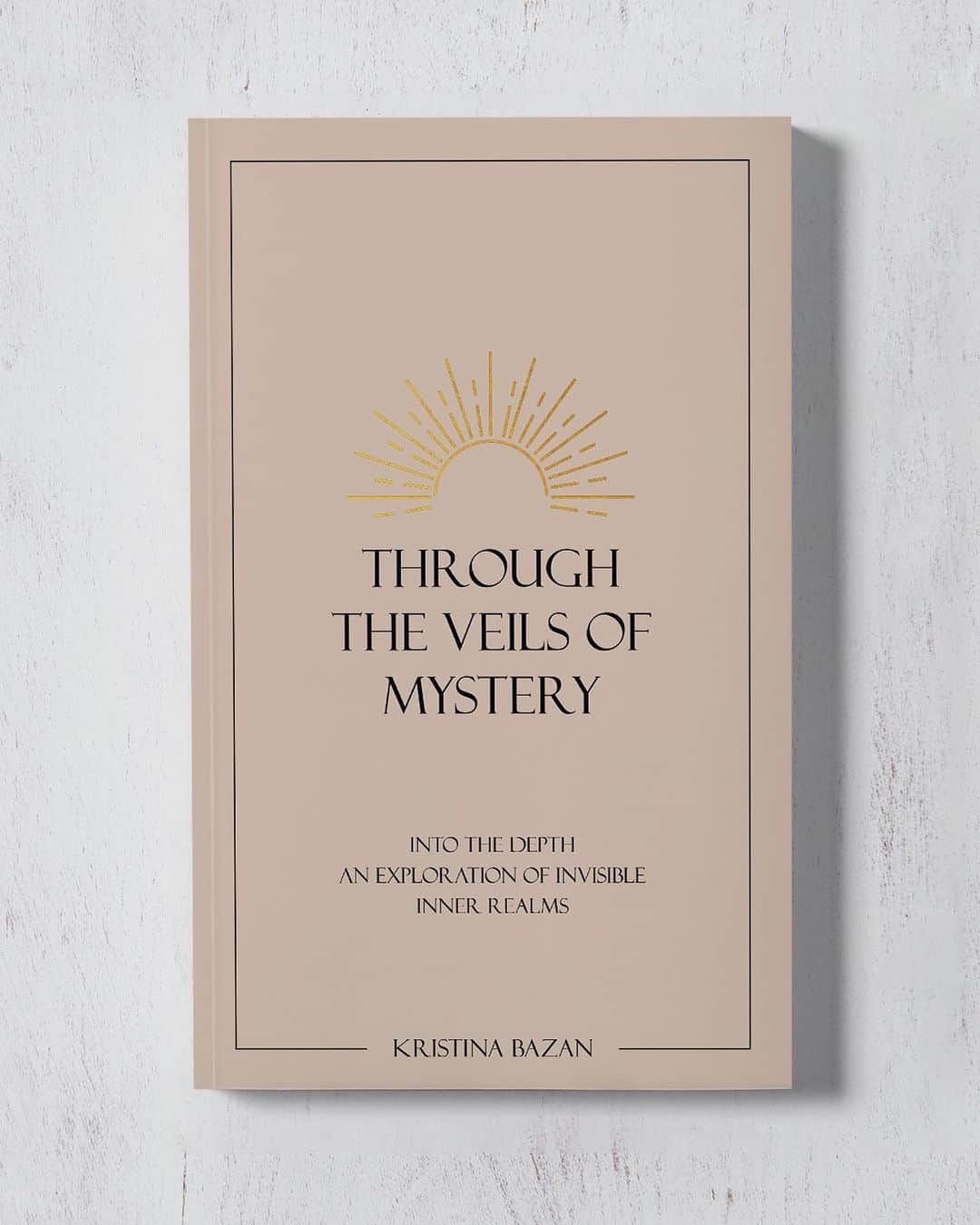 クリスティナ・バザンのインスタグラム：「Here it is!!! My new book “Through the Veils of Mystery” is now available and ready to make it’s way to your bookshelf @thoughtcatalog @shopcatalog (link in bio)🪐✨🤍 In yesterday’s live I explained to you guys how much this book means to me and how it has been healing my heart for the last two years as channeled work, soothing my nervous system and stretching my belief system. There is so much I haven’t shared with you guys about what I went through end of 2019 simply because I felt like it needed the right frame to honor what occurred. In this book I reveal the details of what I call my “awakening process”. The second part of the book is an initiation through poetry into your own self revelation. It is structured in a way to access the subconscious mind and retrieve lost memories. Many of you have witnessed a massive transformation in my life and it’s true. I’ve reconnected with parts of myself which I had lost, which were broken and fragmented. The words of this book came through higher planes as pure medicine when my soul was ready to receive it, soothing my wounds and applying healing balm onto them. “Through the Veils of Mystery” is a divine reclamation of our power. The power we gave away, to lovers, friendships, careers, family members. This book is a profound healing template and support for those ready to truly meet themselves : all of themselves and to face the truth of their divinity. To make peace with that word beyond any and all dogma. The words of this book have been healing me in such profound ways and I know they will find those that are meant to read it. Those ready to heal and rise in oneness. Thank you @thoughtcatalog for believing unequivocally in this book and it’s gentle yet fierce transformative power. I am the humble messenger of this text, and it is an honor to share it now with you as it has been shared onto me through the invisible realms 🤍   Get your copy at shopcatalog.com or amazon.com/amazon.uk/amazon.fr/amazon.de/etc. 💌  DM me if you need help to get your copy ❤️  #ThroughtheVeilsofMystery」