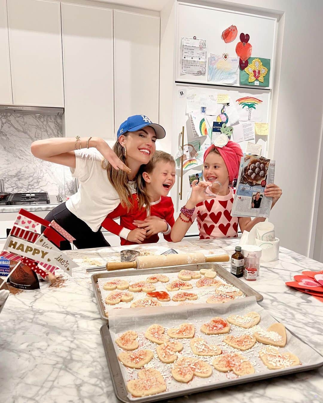 Elizabeth Chambers Hammerのインスタグラム：「My baby girl officially has braces😭 Also, made our @birdbakery (my mom’s) Bourbon Balls and (my grandmother’s) sugar cookies last night. Both of which you need to make todaaay. Recipes here and in bio. Happy Valentine’s Day, lovers! 💕❤️」