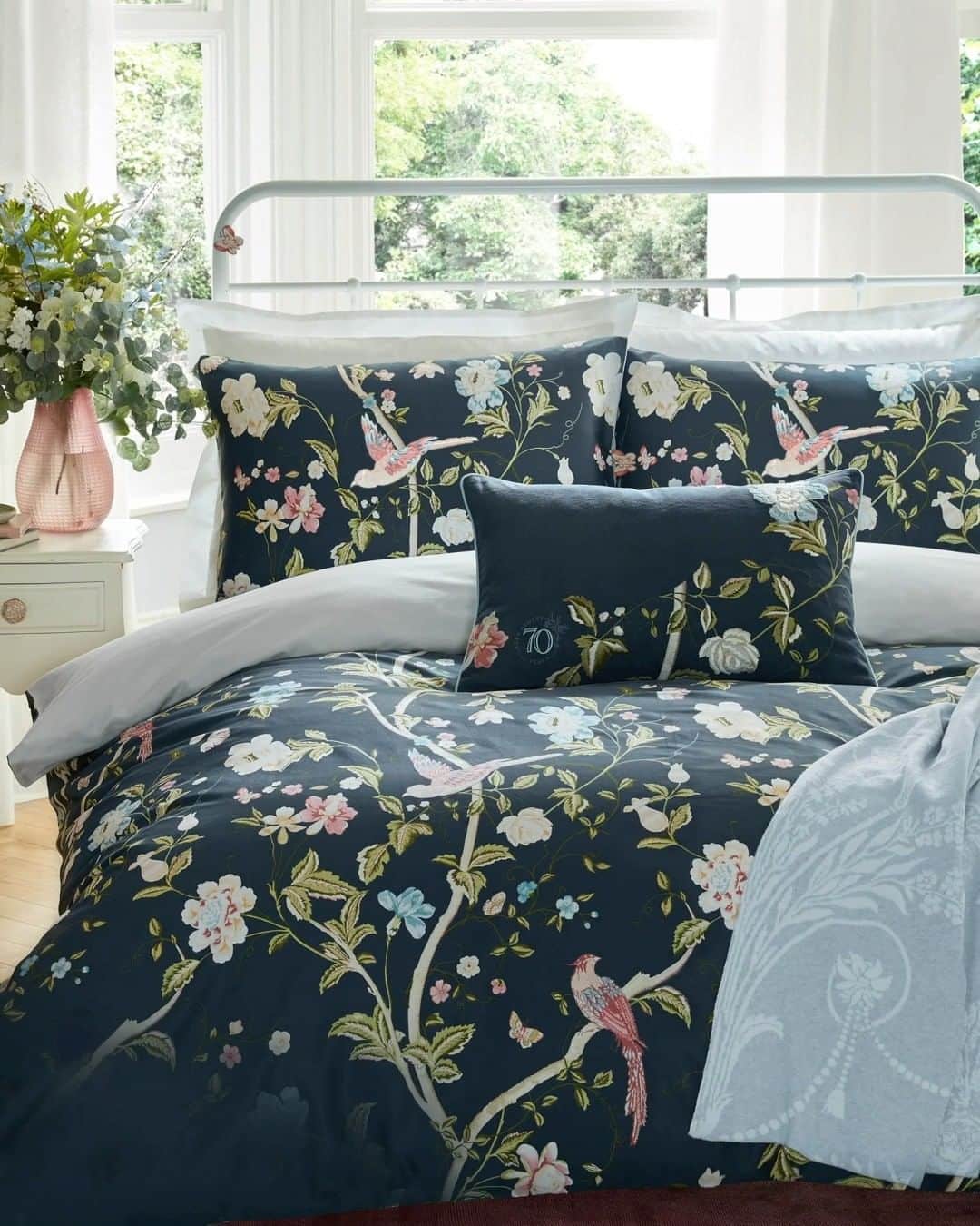ローラアシュレイのインスタグラム：「Let your home bloom with our special edition 70th Anniversary prints, like the customer's favourite Summer Palace design in the striking Midnight Navy shade.  Now available across curtains, bedding and cushions.」