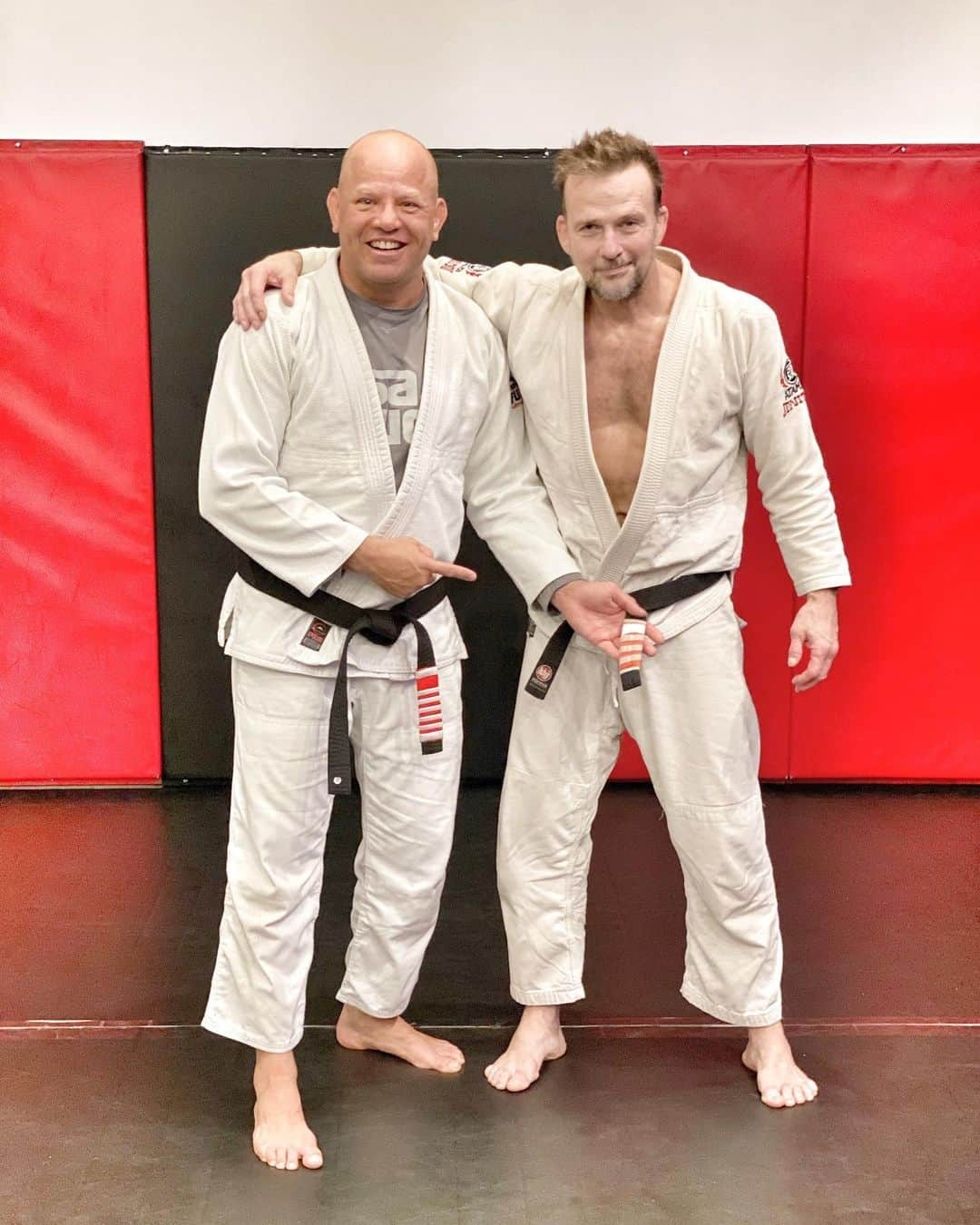 ショーン・パトリック・フラナリーのインスタグラム：「One of the most magnificent monuments in all of Jiu Jitsu is the incalculably high value… of less than a penny’s worth of cloth athletic tape. Truly an honor for @rodrigoantunesbjj to stop by @firebird.productions.wrestling @hbjjhouston and place that 6” strip on my belt with all of my family present. A privilege to be under his tutelage. 🙏🏼🥋」