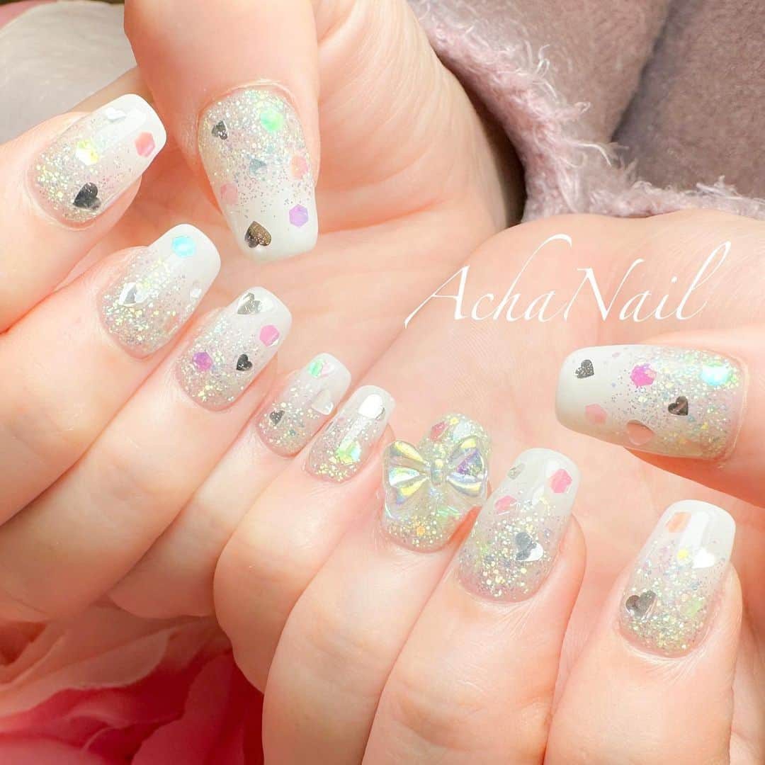 AchaNailのインスタグラム：「キラキラ💖 ⁡ https://ameblo.jp/acha-nail/entry-12793975395.html ⁡ #推し活 #推し活ネイル #ホワイトネイル #グラデーションネイル #キラキラネイル #リボンネイル #ネイル #ジェルネイル #フィルイン #フィルイン導入サロン #南池袋 #池袋 #池袋ネイルサロン #ネイルデザイン #ホワイトネイル #ハートネイル #ラメグラデーション #Nails #AchaNail #NailStagram #InstaNails #Nailart #JapaneseNailart #NailDesign #Gelnails #kawaii #네일 #日式美甲 #whitenails #gradationnails」