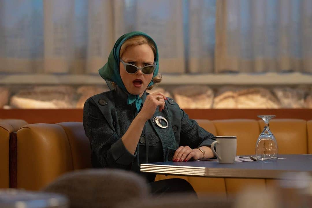 アリソン・ピルのインスタグラム：「My face when I hear you haven’t watched #hellotomorrow on @appletvplus yet.  Episode 4 out now! (Image description: a white blonde woman in scarf and sunglasses sitting at a diner table with a look of disgust/horror)」