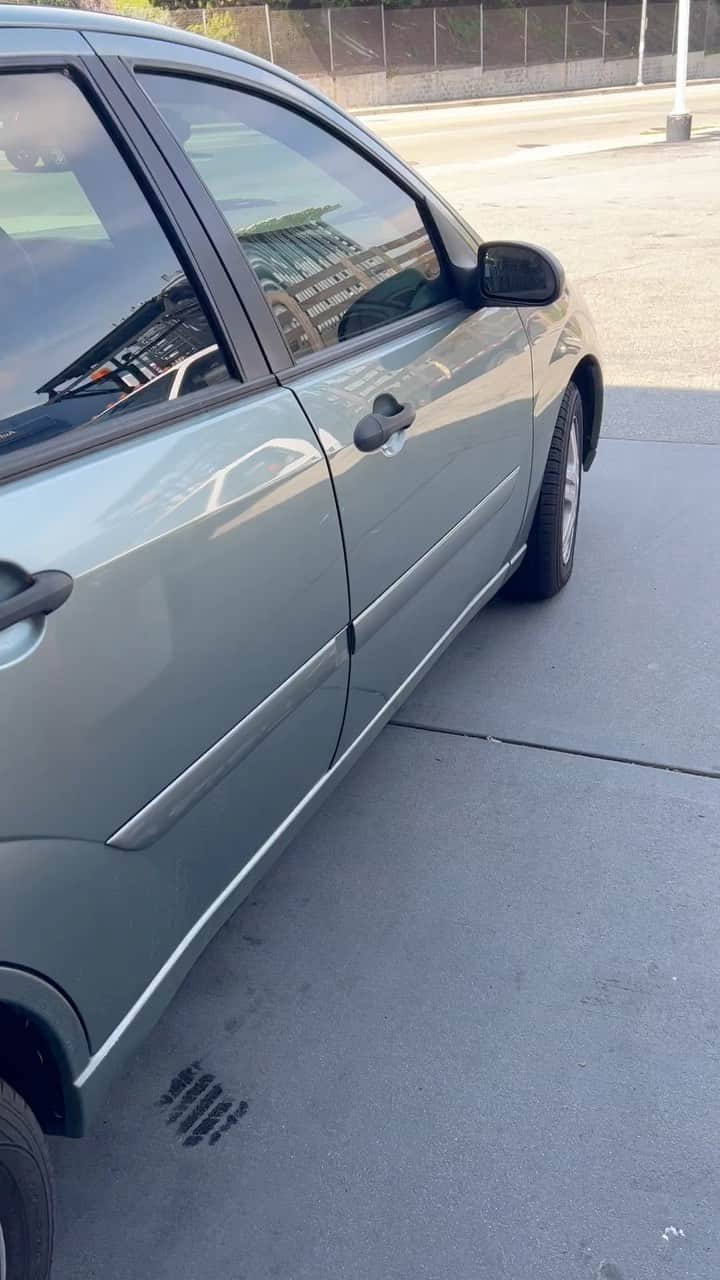 ストーン・コールド・スティーブ・オースチンのインスタグラム：「Gassin’ up the 700hp 2003 Ford Focus. If you see me at a stop light, Try Me. I dare ya..  Mean Streets, USA  Van Halen Mean Street  #ford #focus #pinkslips #usa #america #hotrod  #metallicpea」