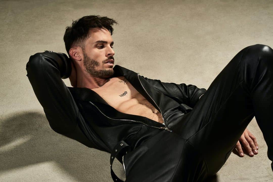 ジトロワのインスタグラム：「BAPTISTE GIABICONI I featuring our mens jumpsuit ‘Kristen’ in stretch leather available on jitrois.com #Jitrois @Baptiste.Giabiconi lensed by Yannick Leconte  Assistant Photo : @Adrienplaud.studio Stylist: @thibaud.romain Hair: @fabbhairdresser Thanks @Rosewoodhoteldecrillon  @Eliefromtheotherside @lea.lebourgpro @apmmonaco」