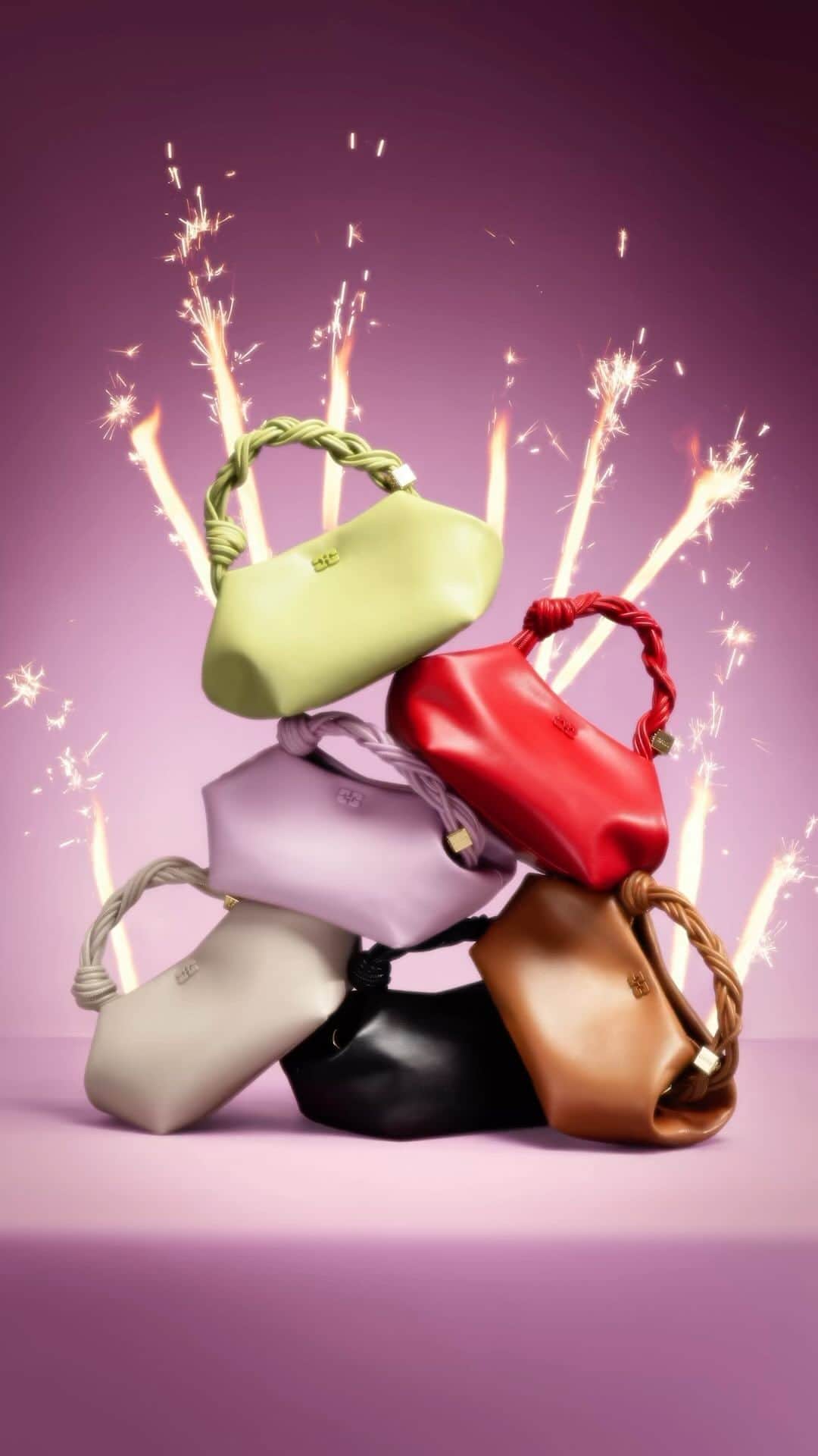 ガンニのインスタグラム：「The GANNI Bou bag is here 💫  Meet our new icon that celebrates luxury for a new era  Stamped with our signature GANNI butterfly logo, its playful design is distinguished by its hexagonal silhouette and knotted handle  “This bag is really what GANNI is all about. We really wanted to design something that speaks to a modern luxury mindset.”    - Ditte Reffstrup, Creative Director,   #GANNI」