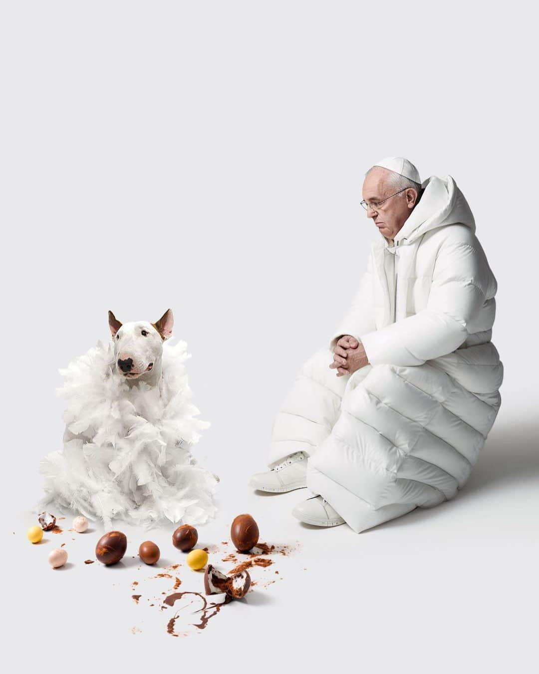 ラファエルのインスタグラム：「HAPPY EASTER #midjourney   prompt: Vogue editorial picture of a full body sitted Pope Francis. he is sad looking down. he is wearing a white oversized puffer coat in a white studio. difuse light」